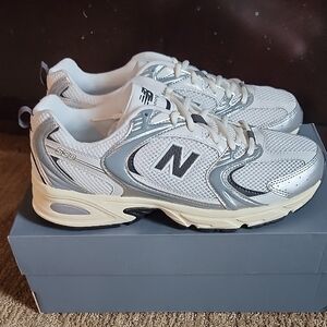 New Balance White and Silver Athletic Shoes